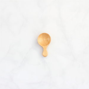 hand carved wooden scoop made from mango